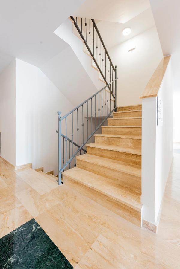 Apartamentos Toboso Plaza Nerja Exterior photo A handrail